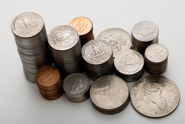 Free Photo still life of dollar coins piles