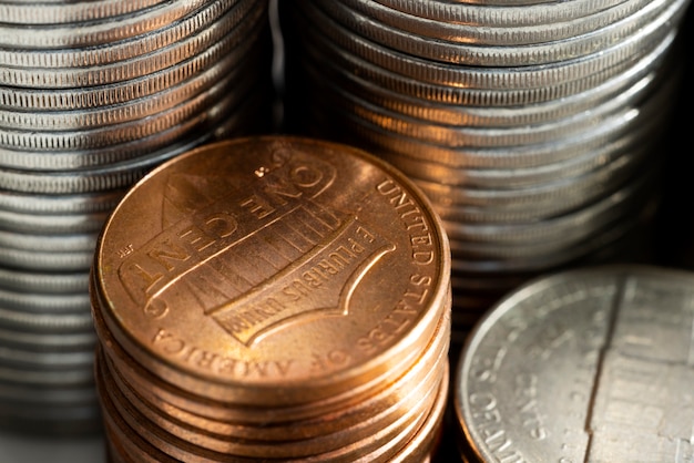 Still life of dollar coins piles