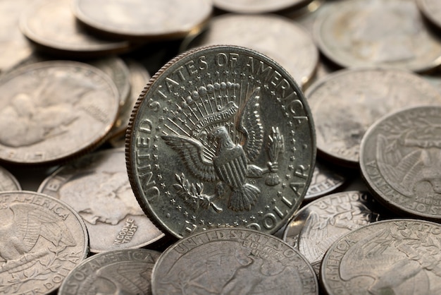 Free photo still life of dollar coins scattered