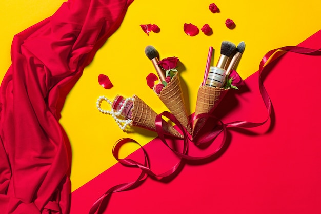 Free photo still life of fashion woman, objects on yellow table