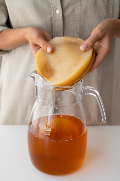 Free photo still life of kombucha bottle