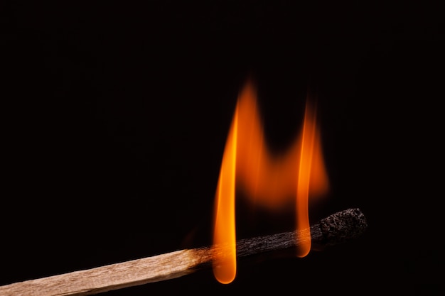 Still life of matches burning