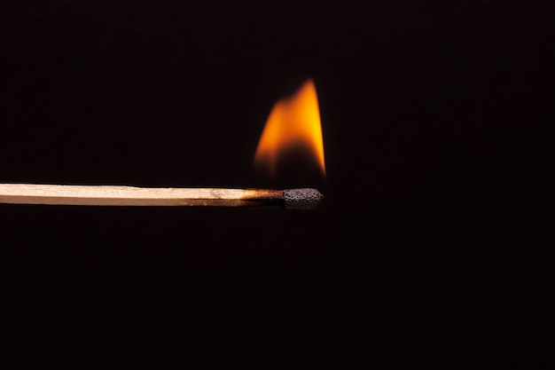 Still life of matches burning