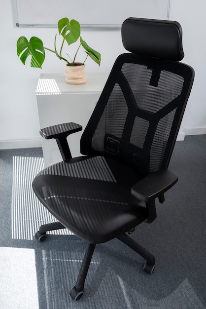 Free photo still life of office chair indoors