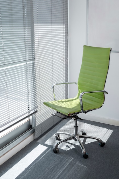 Free Photo still life of office chair indoors