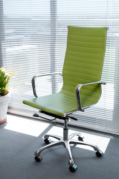 Free Photo still life of office chair indoors