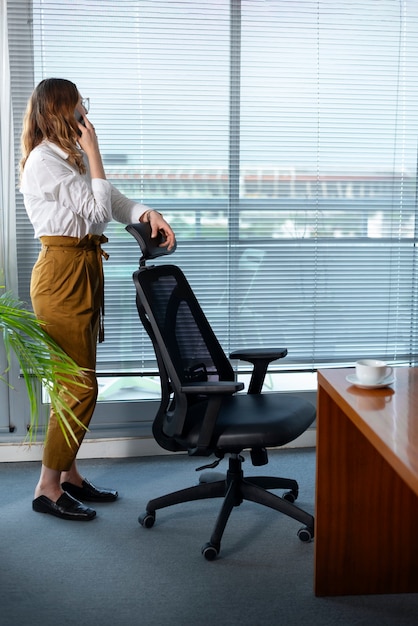 Free photo still life of office chair indoors