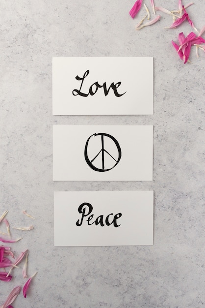 Free photo still life peace day arrangement with flower petals