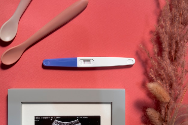 Still life of positive pregnancy test