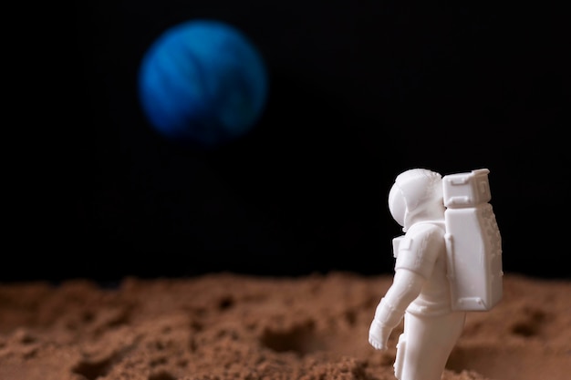 Free photo still life space arrangement with astronaut