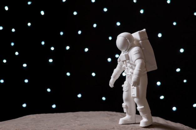 Free photo still life space arrangement with astronaut