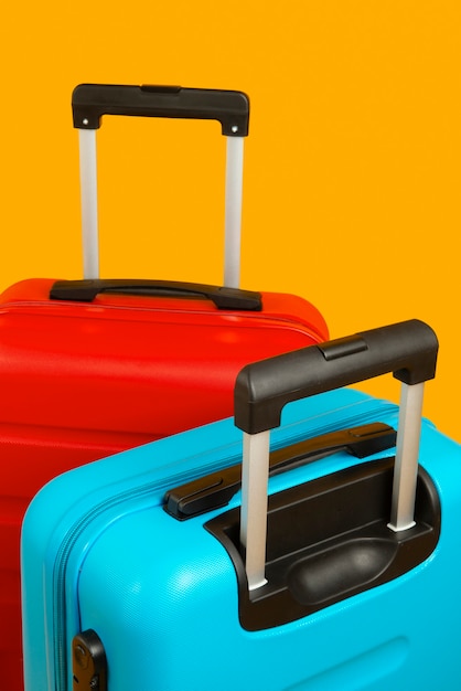 Free photo still life of suitcases with wheels