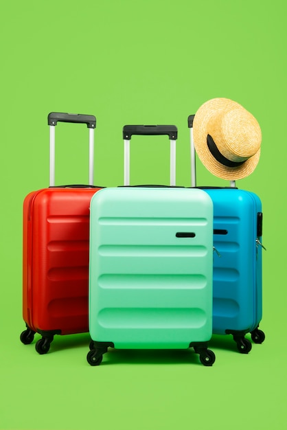 Free photo still life of suitcases with wheels