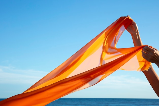 Free photo still life of waving fabric in the air