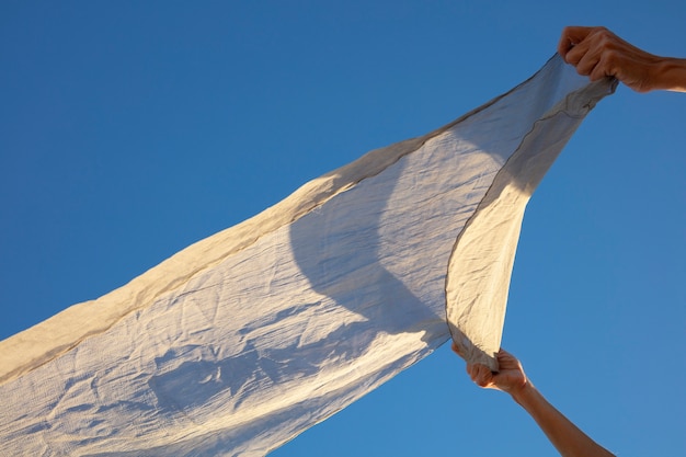 Free photo still life of waving fabric in the air