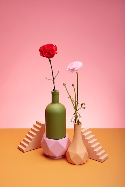 Free photo still life with colorful leaves and flowers