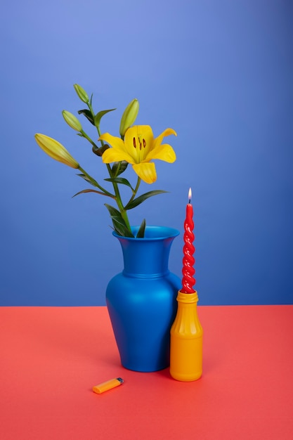 Free Photo still life with colorful leaves and flowers