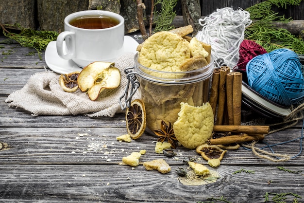 Still life with cookies and spices on wood