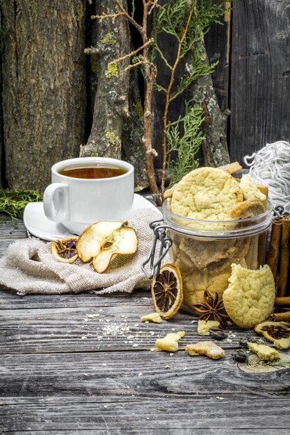 Still life with cookies and spices on wood