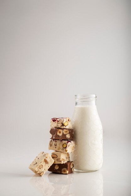 Still life with delicious nougat and milk