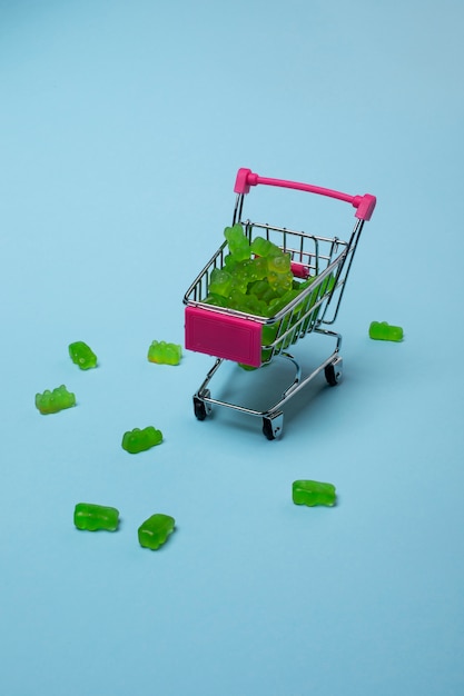 Still life with green gummy bears