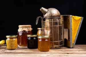 Free photo still life with honey utensils