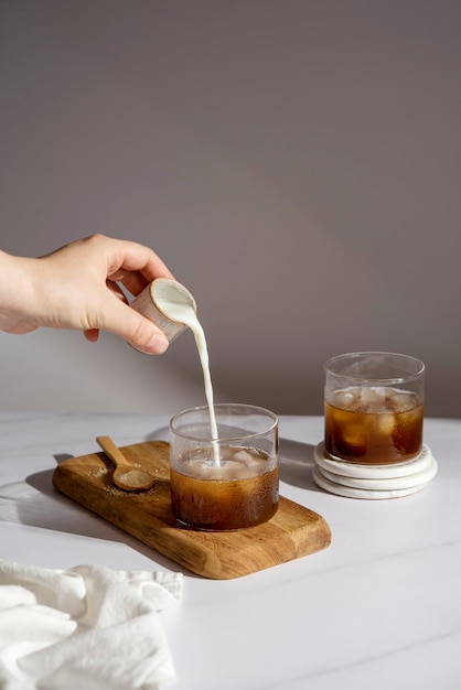 Free photo still life with iced coffee beverage