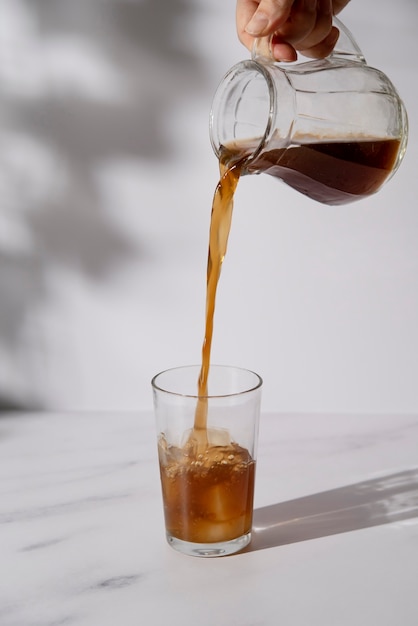 Free photo still life with iced coffee beverage