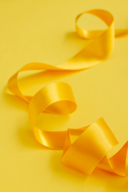 Free Photo still life of yellow ribbon