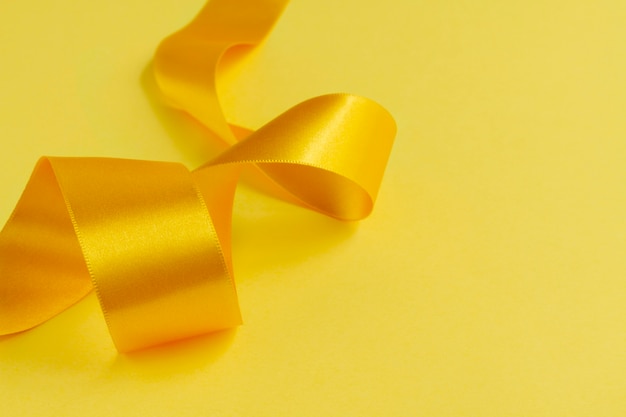 Still life of yellow ribbon