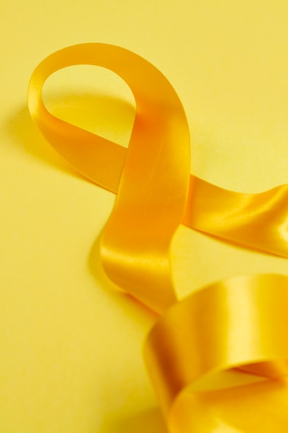 Free photo still life of yellow ribbon