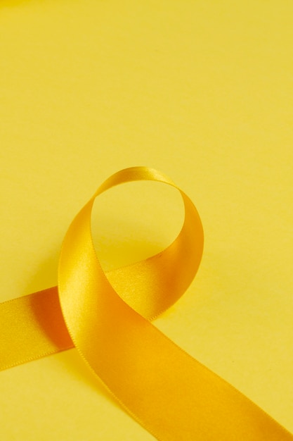 Free photo still life of yellow ribbon