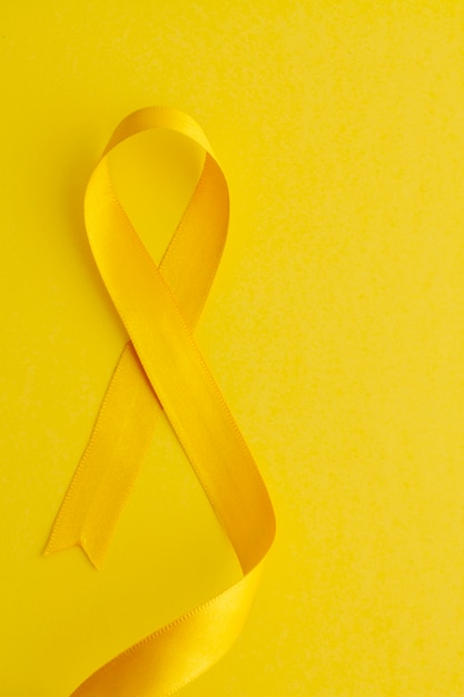 Free photo still life of yellow ribbon