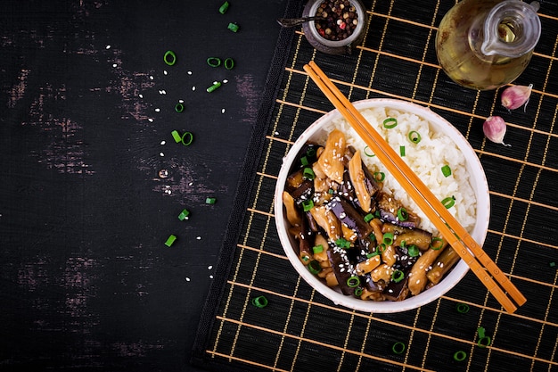 Stir fry with chicken, eggplant and boiled rice