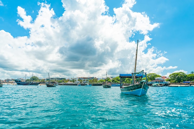 Free Photo stone town zanzibar  december 22 2021 boats in a port of stone town zanzibar tanzania