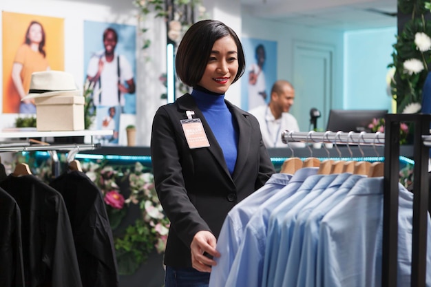 Store assistant checking merchandise