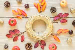 Free photo straw cycle between foliage and apples