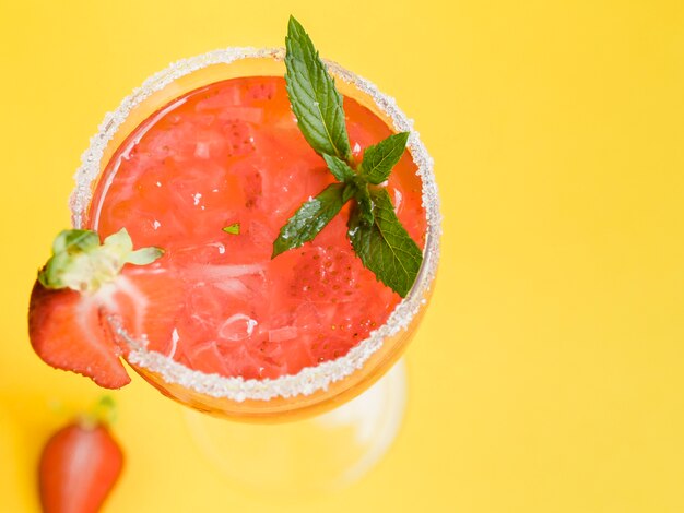 Strawberry cocktail with fresh fruit and mint