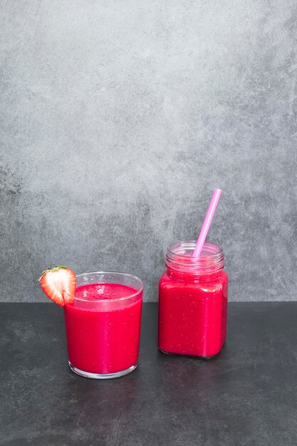 Strawberry fresh smoothie on table