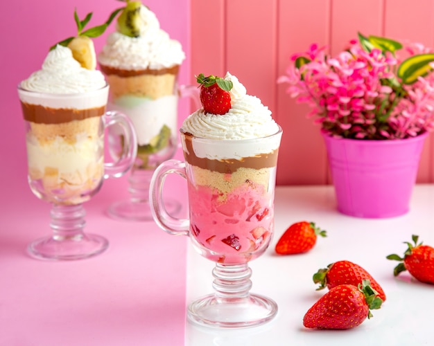 strawberry parfait with crumbled cookies yogurt caramel whipped cream and strawberry