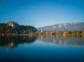 Free photo straza hill above lake bled in slovenia under the blue sky