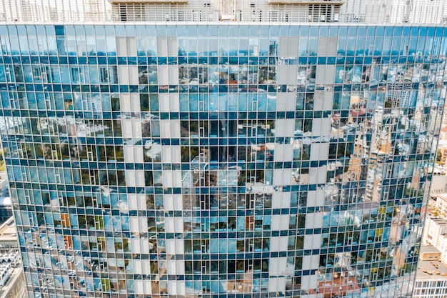 Free Photo street reflection on glass steel building facade