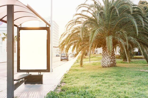 Street with advertising stand on bus stop