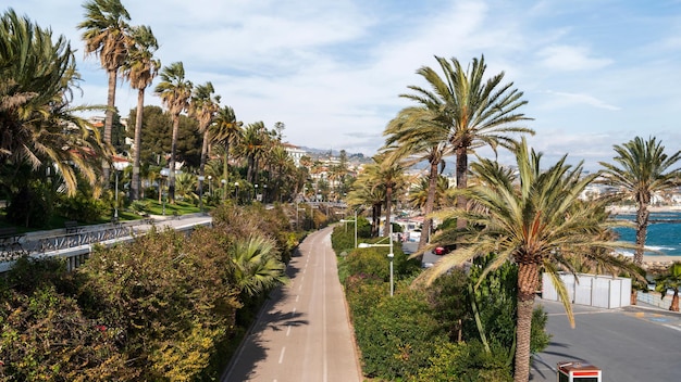 Streetscape of Sanremo Italy Embankment street a lot of greenery Mediterranean sea coast