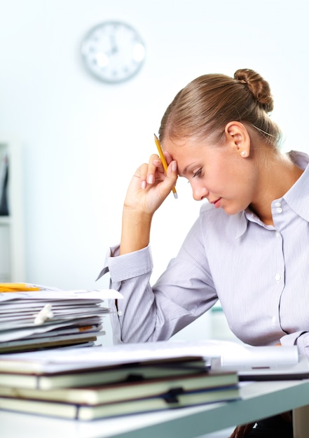 Stressed employee in her office