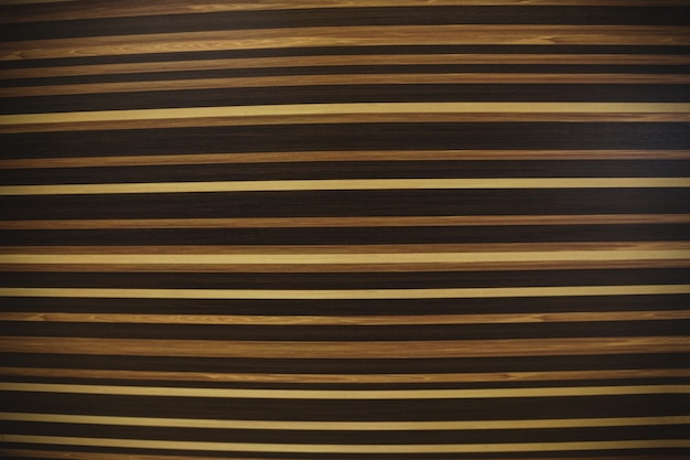 Free Photo striped pattern on wooden surface background