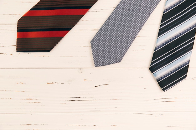 Free Photo striped ties on desk