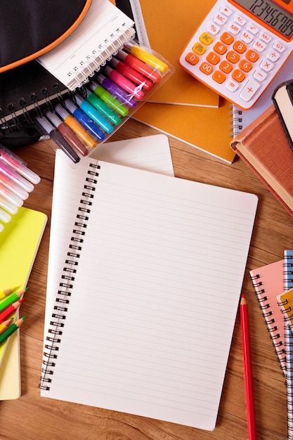 Student desk with blank writing book