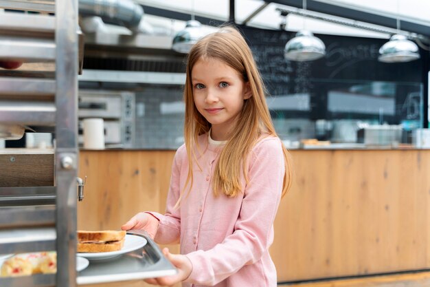 Student having lunch in the canteen