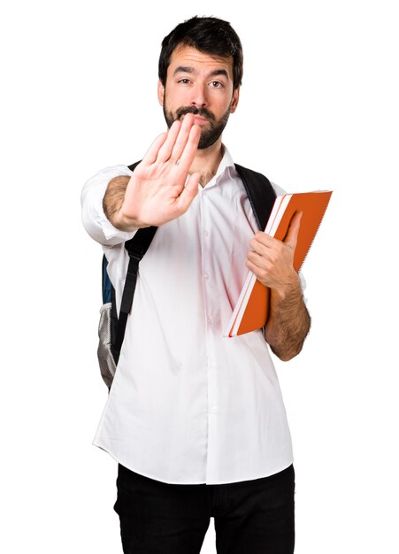 Student man making stop sign